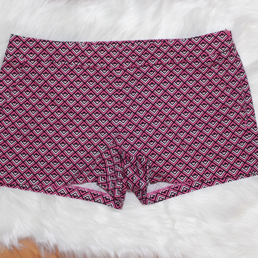 Express, white and pink printed shorts.